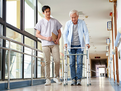 Daughter showing concern for her aging mother who's in a wheelchair